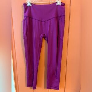 Lululemon 7/8 Leggings with Side Pockets. Beautiful Magenta color. Size 10